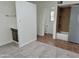 Bright bathroom featuring a walk-in shower, tile flooring, and vanity with modern fixtures at 1822 E Roma Ave, Phoenix, AZ 85016