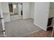 Bedroom featuring carpeted floors, mirrored closet doors and a vanity with modern fixtures at 1822 E Roma Ave, Phoenix, AZ 85016