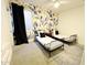 Bedroom with floral wallpaper and two beds, each with two pillows at 1892 S Arroyo Ln, Gilbert, AZ 85295