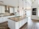 Bright kitchen with a large island, ample counter space, and modern appliances at 1892 S Arroyo Ln, Gilbert, AZ 85295