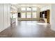 Inviting living room with high ceilings, large windows, and a spacious layout at 1892 S Arroyo Ln, Gilbert, AZ 85295
