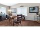 Cozy dining area with hardwood flooring, neutral walls, and natural light at 19616 N Toya St, Maricopa, AZ 85138