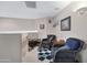 Loft area with hardwood floors, neutral walls, and seating at 19616 N Toya St, Maricopa, AZ 85138