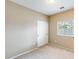 This bedroom features neutral walls, carpet, a window for natural light, and a closet with sliding doors at 1979 N Vista Ln, Casa Grande, AZ 85122