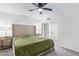 Cozy bedroom with carpet flooring, ceiling fan and neutral color scheme at 2425 W Shady Glen Ave, Phoenix, AZ 85023