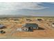 New construction homes in a rural desert community feature spacious lots and mountain views at 25875 W Running Deer Trl, Wittmann, AZ 85361