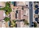 A top-down view of the home, revealing its position amidst neighboring houses and community streets at 2612 W Summerside Rd, Phoenix, AZ 85041