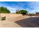 Picturesque backyard with rock landscaping offering privacy and space for outdoor enjoyment at 2612 W Summerside Rd, Phoenix, AZ 85041