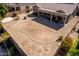 A beautiful backyard with a covered patio and landscaping, perfect for outdoor living at 2612 W Summerside Rd, Phoenix, AZ 85041