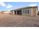 The backyard area offers a blank canvas with potential for future landscaping at 26696 W Siesta Ln, Buckeye, AZ 85396