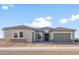 Stunning single-story home featuring a tile roof and three-car garage at 26696 W Siesta Ln, Buckeye, AZ 85396