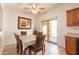 Cozy dining area with a sliding door to the backyard, adjacent to the kitchen at 3107 S 74Th Ln, Phoenix, AZ 85043