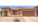 Charming single-story home featuring a terracotta tile roof and desert landscaping for low maintenance living at 3107 S 74Th Ln, Phoenix, AZ 85043