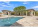 The expansive backyard has a pool and covered patio, perfect for outdoor relaxation and entertaining at 3461 E Indigo Cir, Mesa, AZ 85213