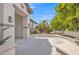 Inviting front porch with decorative lighting and mature landscaping enhances the entry to this beautiful home at 3461 E Indigo Cir, Mesa, AZ 85213