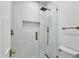Walk-in shower with glass door and bronze fixtures at 3461 E Indigo Cir, Mesa, AZ 85213