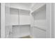 Walk-in closet with custom shelving and ample storage space at 3461 E Indigo Cir, Mesa, AZ 85213