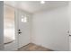 Bright and airy entryway with white walls, and a charming front door at 3632 E Poinsettia Dr, Phoenix, AZ 85028