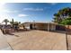 The charming single-story home has desert landscaping and a spacious driveway with covered parking at 3632 E Poinsettia Dr, Phoenix, AZ 85028