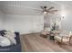 Bright living room featuring hardwood floors, white walls and modern furniture at 3632 E Poinsettia Dr, Phoenix, AZ 85028