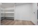 Pantry features custom shelving for optimal storage in a clean, white space at 3632 E Poinsettia Dr, Phoenix, AZ 85028
