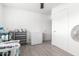 Clean basement space with tile flooring, with shelving and a deep freezer at 3736 W Hazelwood St, Phoenix, AZ 85019