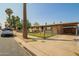 Charming single-story home featuring a gated front yard and covered carport at 3736 W Hazelwood St, Phoenix, AZ 85019