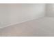 Neutral carpet in a room with baseboards and a window offering natural light at 4107 S 176Th Dr, Goodyear, AZ 85338