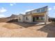 Large backyard with ample space, a covered patio, and a blank canvas for landscaping at 4113 S 176Th Dr, Goodyear, AZ 85338