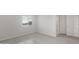 Comfortable bedroom with soft carpet, a bright window, and a convenient closet at 4113 S 176Th Dr, Goodyear, AZ 85338