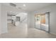 Spacious living area showcasing an open layout that connects to the kitchen and outdoor patio at 4113 S 176Th Dr, Goodyear, AZ 85338