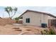 Large backyard with desert landscaping, offering potential for customization at 41580 W Sunland Dr, Maricopa, AZ 85138