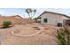 Expansive backyard with desert landscaping, providing a private outdoor area at 41580 W Sunland Dr, Maricopa, AZ 85138