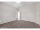 Bedroom showcasing carpet flooring, neutral walls, and a closet for ample storage at 41580 W Sunland Dr, Maricopa, AZ 85138