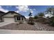 Charming single-story home with desert landscaping and a cozy bay window at 41580 W Sunland Dr, Maricopa, AZ 85138