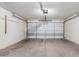Spacious two-car garage with ample room for parking and storage at 41580 W Sunland Dr, Maricopa, AZ 85138