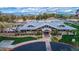 Aerial shot of clubhouse with an attractive design, manicured landscaping, and dedicated parking spaces at 4364 S Tatum Ln, Gilbert, AZ 85297