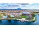 Community lake with a park and clubhouse, creating a serene and picturesque setting for residents to enjoy at 4364 S Tatum Ln, Gilbert, AZ 85297