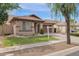 Charming single-story house with a well-maintained lawn and a driveway leading to a two-car garage at 4364 S Tatum Ln, Gilbert, AZ 85297
