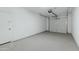 Clean garage with epoxy floor, two doors, and ample space for parking and storage at 4417 N 156Th Dr, Goodyear, AZ 85395
