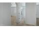 Hallway view showing a bathroom and bedroom at 4417 N 156Th Dr, Goodyear, AZ 85395