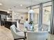 Eat in kitchen, features stainless steel appliances, and flows through to the dining area and living room at 4417 N 156Th Dr, Goodyear, AZ 85395
