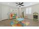 Colorful playroom featuring a table with chairs, toy storage, and a cozy atmosphere at 4417 N 156Th Dr, Goodyear, AZ 85395