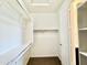 Functional walk-in closet with adjustable shelving and rods for optimal organization at 4417 N 156Th Dr, Goodyear, AZ 85395