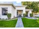 Elegant home exterior with manicured landscaping and a welcoming front entrance at 4901 E Lafayette Blvd, Phoenix, AZ 85018