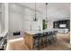 Bright kitchen island with seating, marble countertops, and stainless steel appliances at 4901 E Lafayette Blvd, Phoenix, AZ 85018