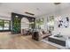 Open concept living room with view of dining table and decorative wall at 4901 E Lafayette Blvd, Phoenix, AZ 85018