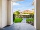 Picturesque desert mountain view framed by an elegant entryway and lush green lawn at 4901 E Lafayette Blvd, Phoenix, AZ 85018