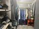 Spacious walk-in closet with organized shelving and ample storage at 5537 E Drummer Ave, Mesa, AZ 85206