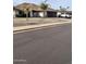 Lovely single-Gathering home with a stone exterior and mature palm trees at 5537 E Drummer Ave, Mesa, AZ 85206